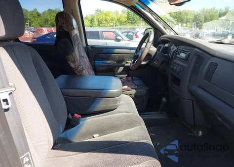 2003 Dodge Ram 1500 Slt/Laramie/St z USA, uszkodzony, nr VIN 1D7HU18N13S109255